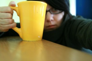 A day when there isn't enough caffeine in the world! (Source: "day 300, clutching my morning coffee" by massdistraction, on Flickr. Some rights reserved.)